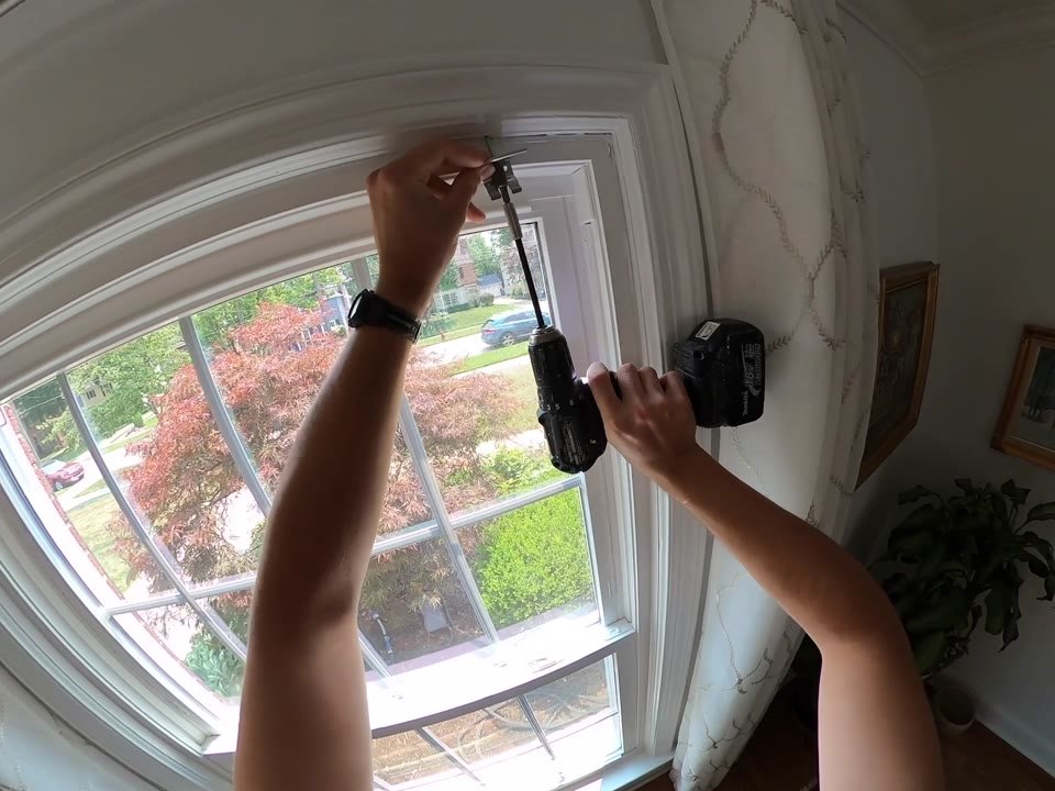 First-person view using a cordless drill near a window